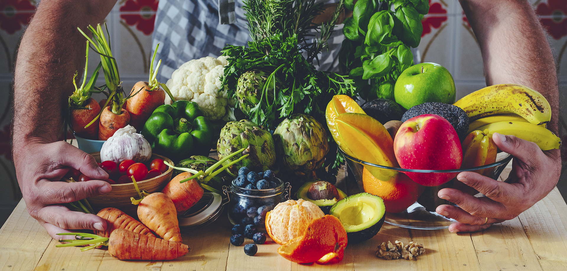 man with composition of fruits and vegetables hug healthy lifest